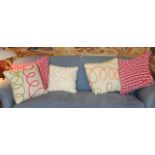 A COLLECTION OF FIVE ASSORTED SCATTER CUSHIONS