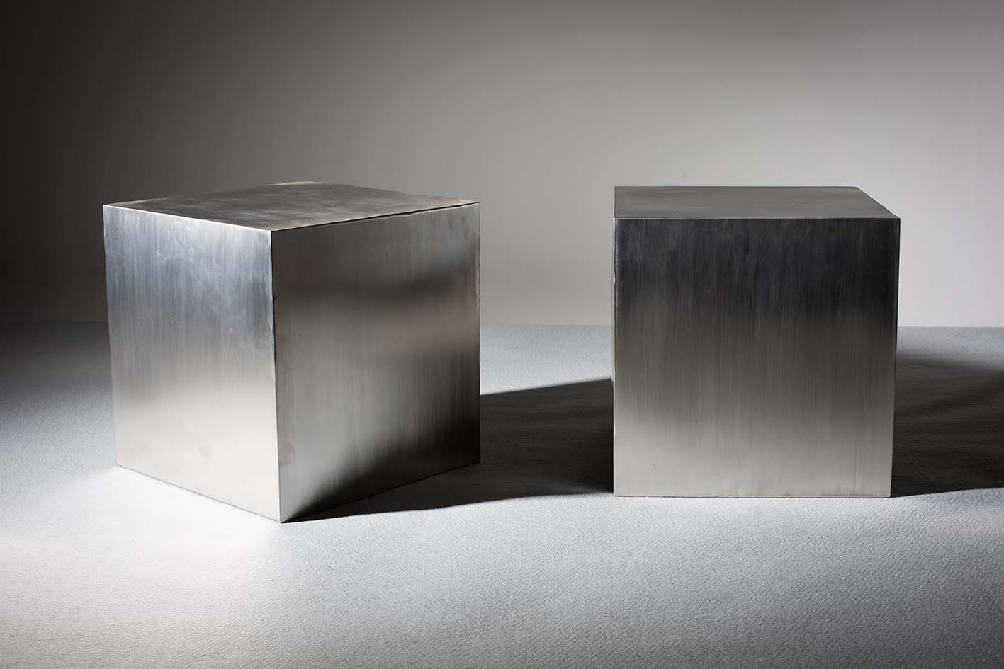 A PAIR OF BRUSHED METAL CUBE SIDE TABLES, 1970s, 40cm x 40cm x 40cm