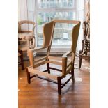 A MAHOGANY FRAME FOR A WING BACK ARMCHAIR