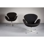 A PAIR OF SWAN CHAIRS by ARNE JACOBSEN FOR FRITZ HANSEN, DANISH, c.1965, on swivel aluminium star