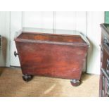 A VICTORIAN MAHOGANY SARCOPHAGUS SHAPED