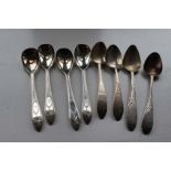 A SET OF FOUR BRIGHT CUT EGG SPOONS, She