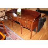 A mahogany serpentine fronted sideboard,