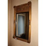 A GILT REGENCY STYLE PIER MIRROR, with e