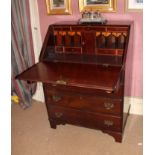 A MAHOGANY SLOPEFRONT BUREAU, 19th CENTU