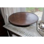 A MAHOGANY LAZY SUSAN with moulded rim o