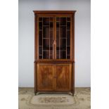 A GEORGIAN MAHOGANY BOOKCASE, with mould