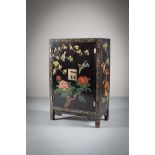 A TWO DOOR UPRIGHT CHINOISERIE CABINET.