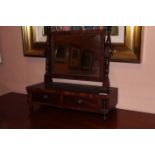 A MAHOGANY DRESSING TABLE MIRROR, with f