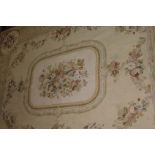 AN AUBUSSON CARPET ON A CREAM GROUND, de