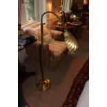 A PAIR OF ANGLE POISE BRASS LAMPS with s