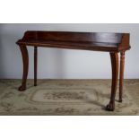 AN IRISH REGENCY MAHOGANY SERVING TABLE,