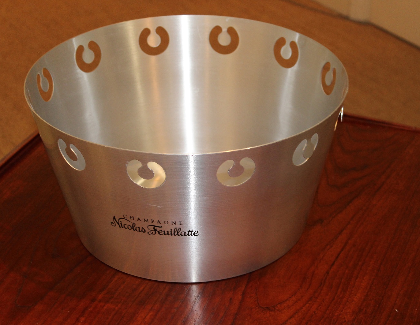 A STAINLESS STEEL CHAMPAGNE BUCKET, BY N