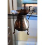 A George III style silver cream jug, of