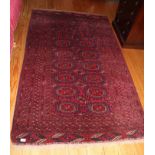 A BOKHARA STYLE RUG decorated with confo