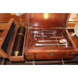 A MAHOGANY AND BRASS BOUND DRINKS IMPLEM