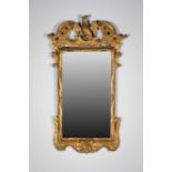 AN IRISH GILTWOOD MIRROR, 18th CENTURY,