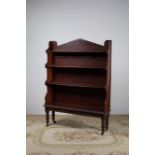 A VICTORIAN MAHOGANY WATERFALL BOOKCASE,