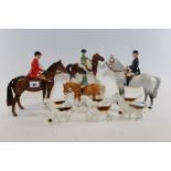 A 20TH CENTURY BESWICK POTTERY HUNTING GROUP comprising:- Huntsman and Horse (glued peak to cap),