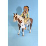 A 20TH CENTURY BESWICK POTTERY MODEL OF A NORTH AMERICAN INDIAN CHIEF upon a Skewbald pony,