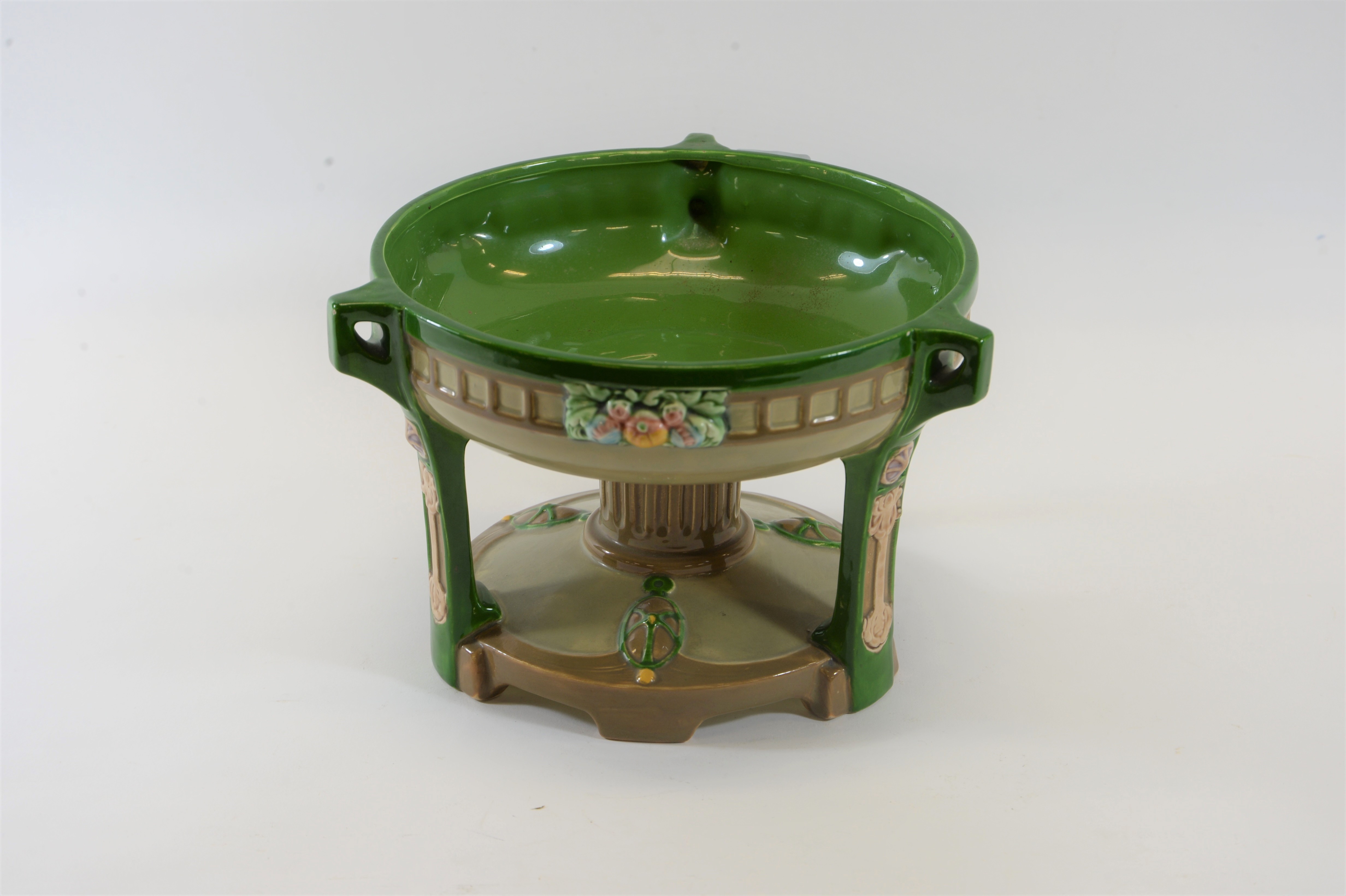 A LATE 19TH/EARLY 20TH CENTURY BOHEMIAN EICHWALD GREEN/BROWN GLAZED POTTERY COMPORT of circular