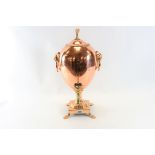 AN EARLY 19TH CENTURY OVOID COPPER SAMOVAR raised on a square base,