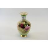 AN EARLY 20TH CENTURY HADLEY'S ROYAL WORCESTER PORCELAIN VASE with hand painted roses and leaves,