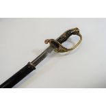 A WWII JAPANESE PARADE SWORD, the pierced brass guard with silver character mark badge,