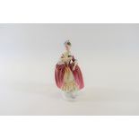 A ROYAL DOULTON PORCELAIN FIGURE, MASQUERADE, No HN 2259, issued 1960-65, designer P.