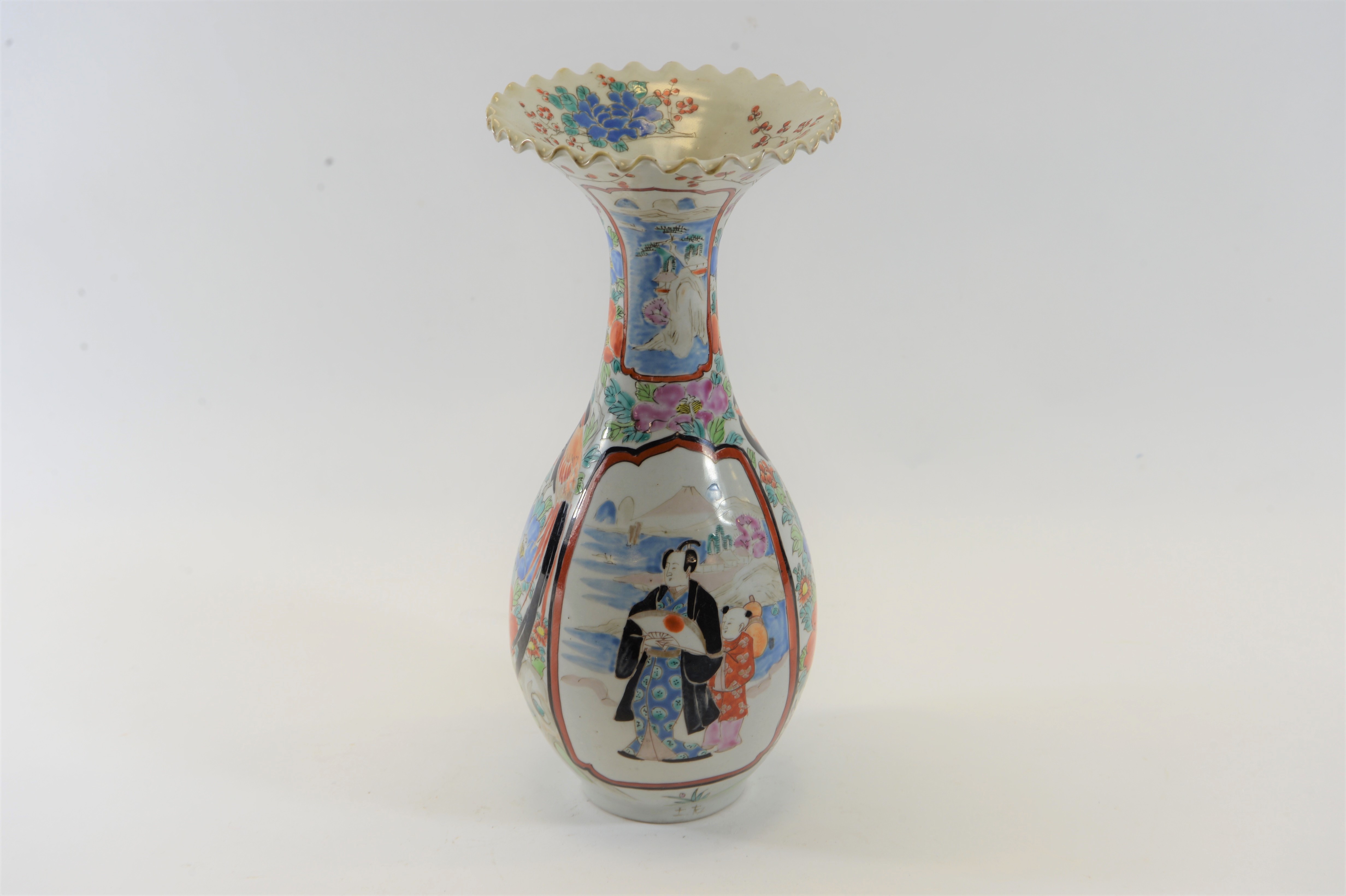 A LATE 19TH/EARLY 20TH CENTURY JAPANESE PORCELAIN VASE decorated with bijn, 11 3/4 ins high,