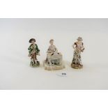 AN EARLY 20TH CENTURY NAPLES PORCELAIN FIGURE OF A LADY seated at a square piano,