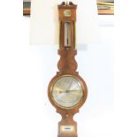 A GOOD QUALITY REPRODUCTION MAHOGANY WHEEL BAROMETER with 8 ins silvered dial, short thermometer,