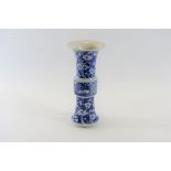 A LATE 19TH CENTURY CHINESE BLUE AND WHITE PORCELAIN GU FORM VASE decorated with two landscape