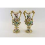 A PAIR OF 19TH CENTURY COALBROOKDALE STYLE PORCELAIN DOUBLE-HANDLED VASES with raised floral