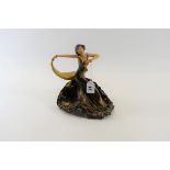 AN EARLY 20TH CENTURY WADE POTTERY FIGURE OF A DANCING GIRL entitled "Argentina", printed marks,