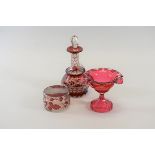 A 19TH CENTURY BOHEMIAN RUBY-FLASH SCENT BOTTLE with associated stopper, 5 1/2 ins high,