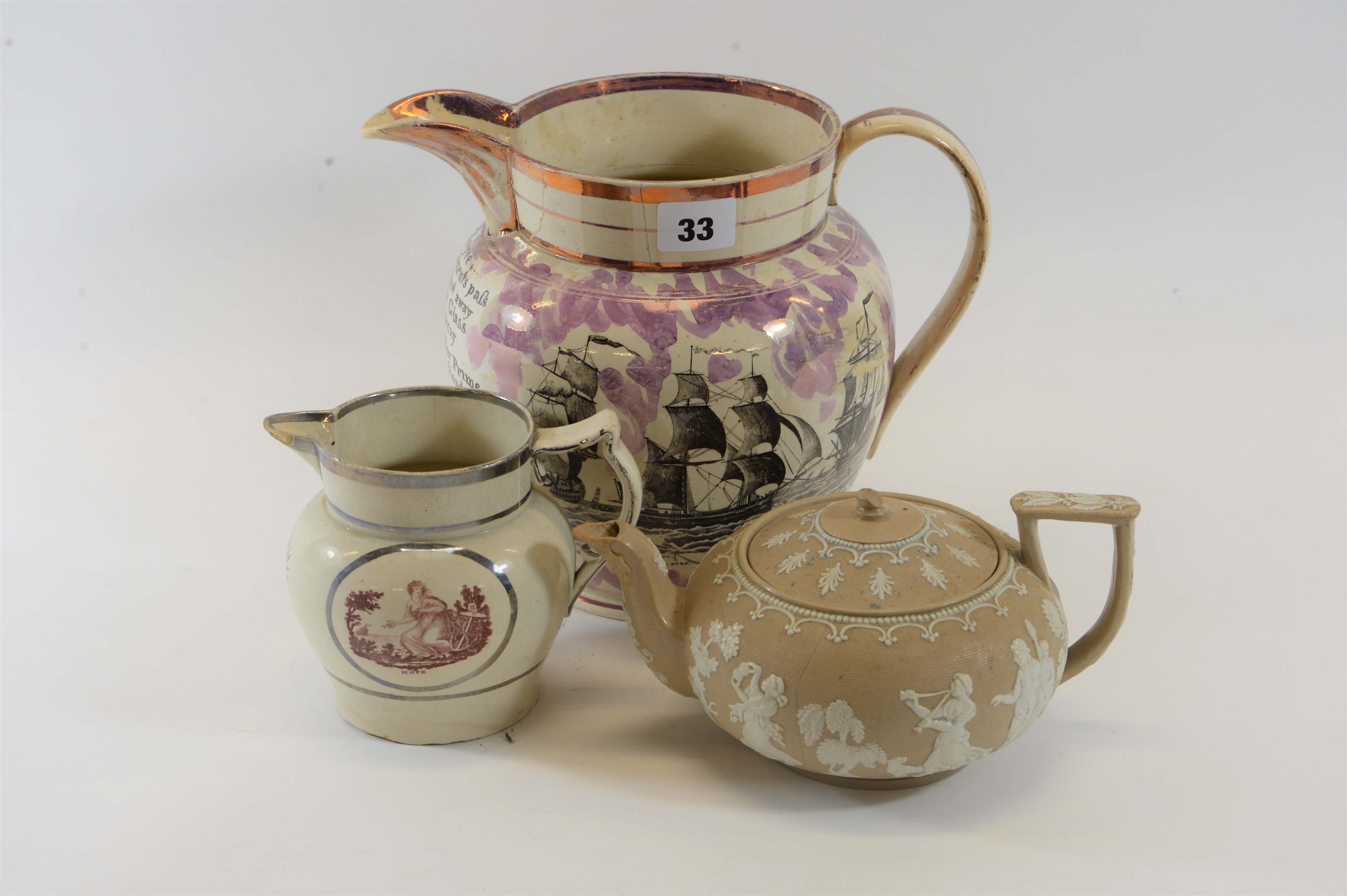 A 19TH CENTURY SUNDERLAND PINK LUSTRE JUG decorated with the Iron Bridge, ships and motto,