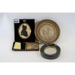 A 19TH CENTURY OVAL SILHOUETTE DEPICTING MRS JANE JACKSON,