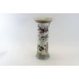 A 20TH CENTURY CHINESE PORCELAIN CYLINDRICAL VASE with flared rim decorated in polychrome enamels