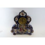 A LATE VICTORIAN TRANSFER DECORATED POTTERY CASED MANTLE CLOCK,