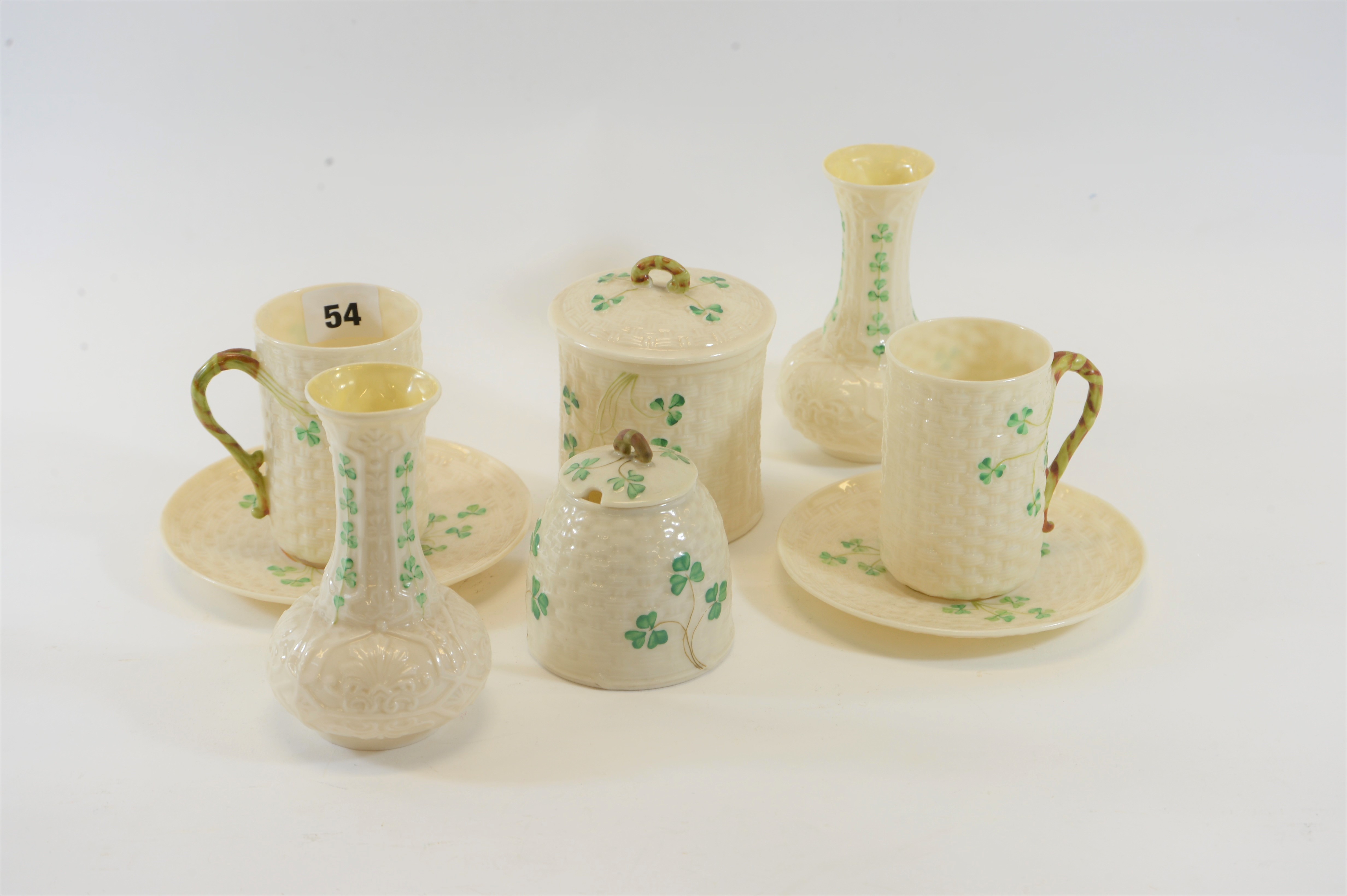 A PAIR OF MID 20TH CENTURY IRISH BELLEEK PORCELAIN SHAMROCK PATTERN FAUX BASKET WEAVE BEAKERS AND