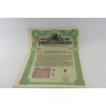 AN IMPERIAL CHINESE GOVERNMENT £20 HUKUANG RAILWAYS 19 INS BOND AND A STADIUM DE PARIS BOND.