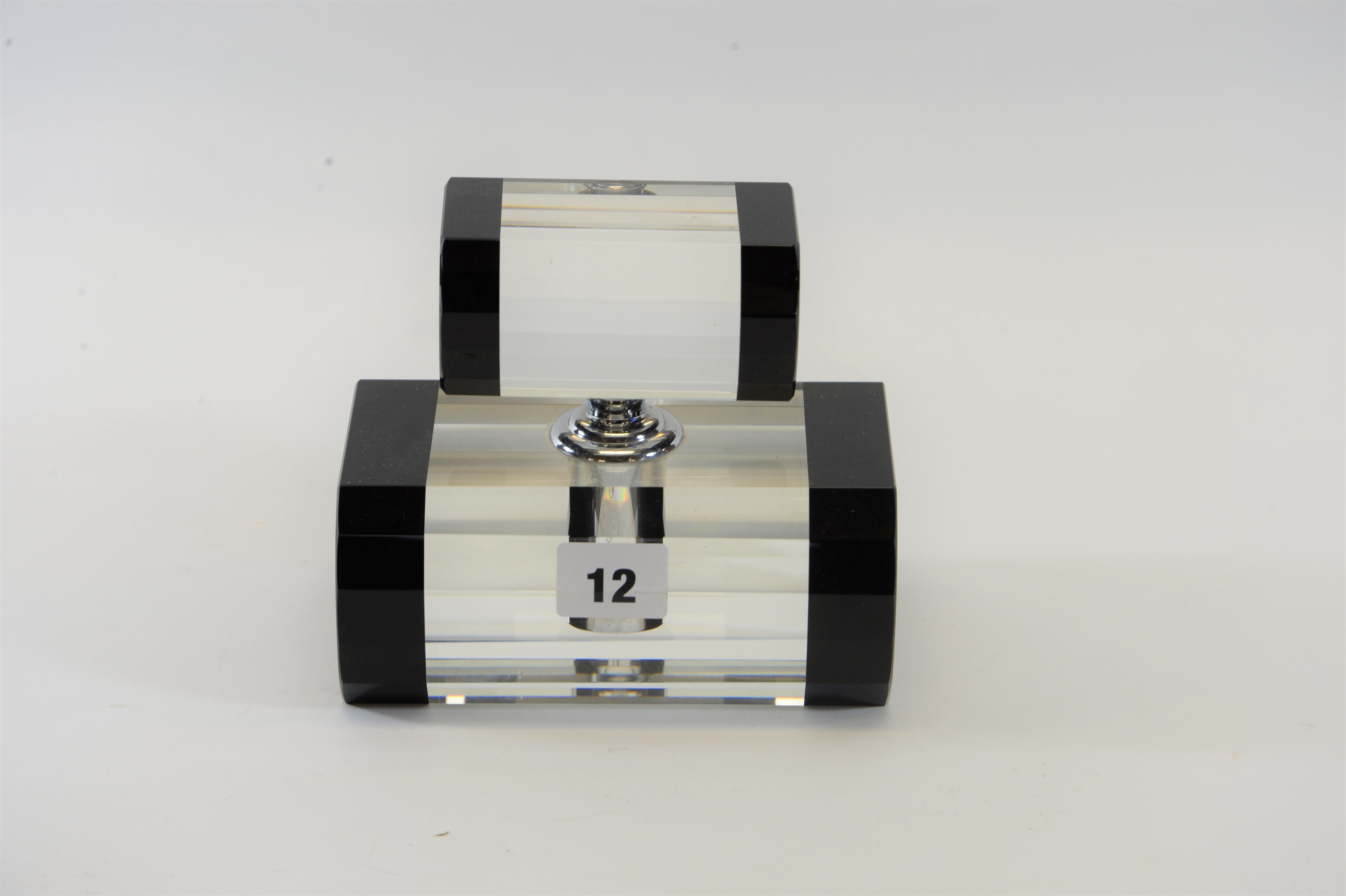 A LARGE ART DECO DESIGN SHOP DISPLAY SCENT BOTTLE AND STOPPER of rectangular form with black