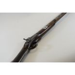 A 19TH CENTURY PERCUSSION-ACTION SINGLE BARRELLED SPORTING GUN,
