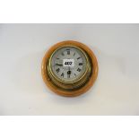 A 20TH CENTURY SESTREL BRASS BULKHEAD SHIPS CLOCK, 4 ins silvered dial retailed by H.