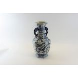 A CHINESE BLUE AND WHITE UNDERGLAZE PORCELAIN VASE of hexagonal form decorated with fabulous bird