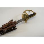 A GEORGE V INFANTRY SWORD with pierced brass basket hilt and shagreen grip,