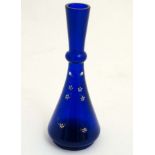 A late 19thC / early 20thC Bristol blue glass bud vase with enamel decoration 7 1/4" high