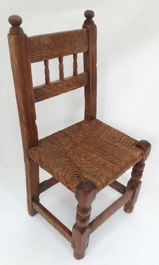 Carved rush seated chair CONDITION: Please Note - we do not make reference to the