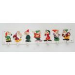 A 21st C painted cast metal "seven Dwarves" cup or coat rack with 7 hooks 28 1/2" long